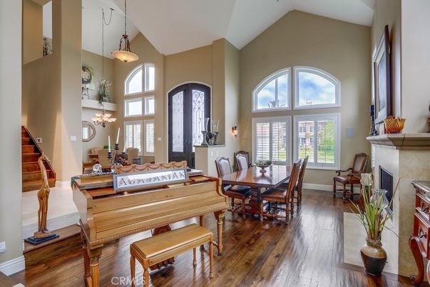 Dining room, Fireplace, Interior, Pendant Lights, Piano, Wood Texture Flooring