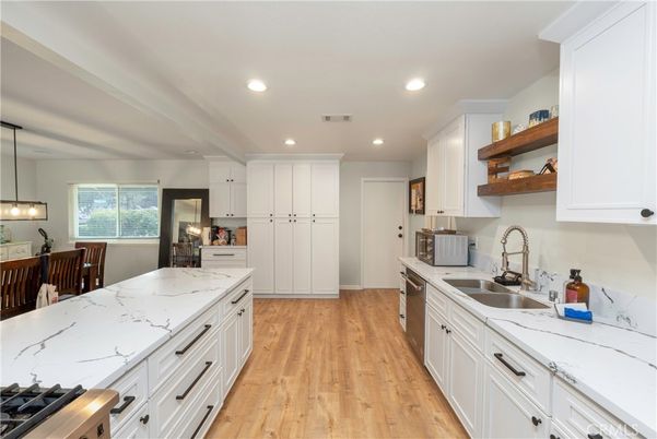 Dining room, Interior, Kitchen, Recessed Lighting, Stainless Steel Appliances, Wood Texture Flooring