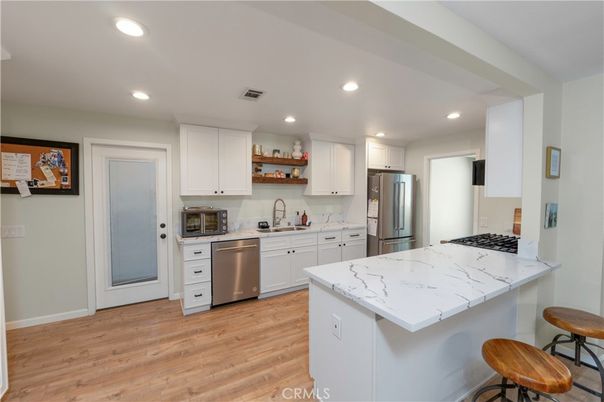 Interior, Kitchen, Recessed Lighting, Stainless Steel Appliances, Wood Texture Flooring