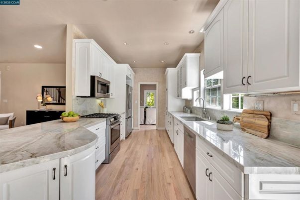 Interior, Kitchen, Recessed Lighting, Stainless Steel Appliances, Wood Texture Flooring