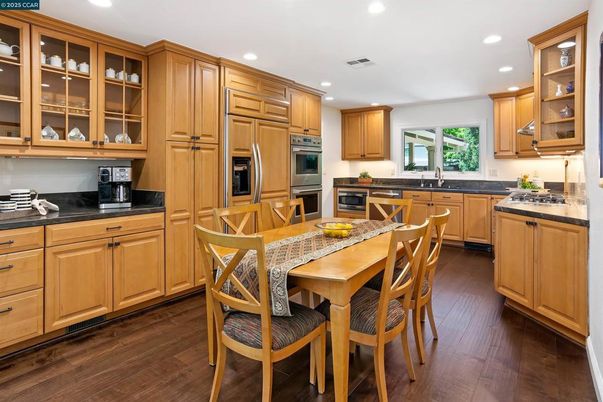 Dining room, Interior, Kitchen, Recessed Lighting, Stainless Steel Appliances, Wood Texture Flooring