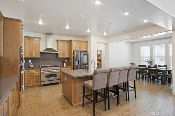 Dining room, Interior, Kitchen, Recessed Lighting, Stainless Steel Appliances, Wood Texture Flooring