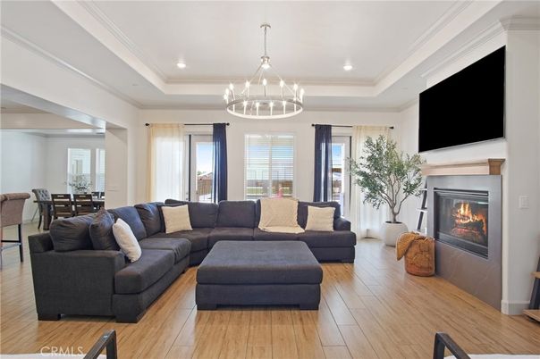 Dining room, Fireplace, Interior, Living room, Pendant Lights, Recessed Lighting, Wood Texture Flooring