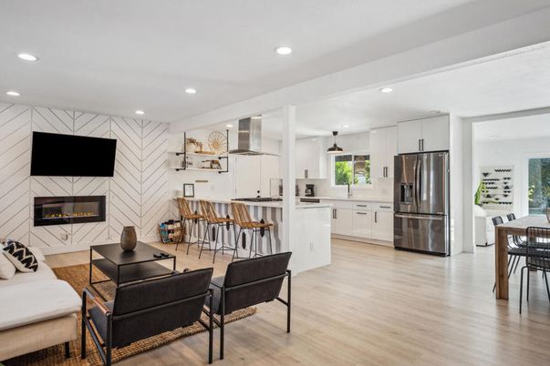 Fireplace, Interior, Kitchen, Living room, Recessed Lighting, Stainless Steel Appliances, Wood Texture Flooring