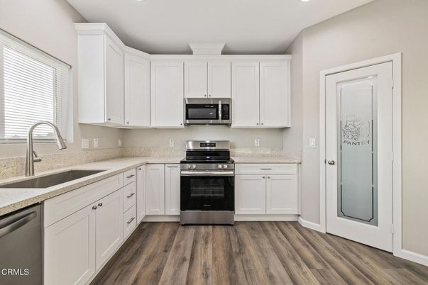 Interior, Kitchen, Recessed Lighting, Stainless Steel Appliances, Wood Texture Flooring