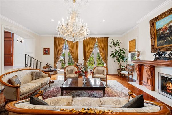 Chandelier, Fireplace, Interior, Living room, Recessed Lighting, Wood Texture Flooring