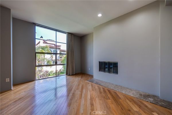 Empty room, Fireplace, Interior, Recessed Lighting, Wood Texture Flooring