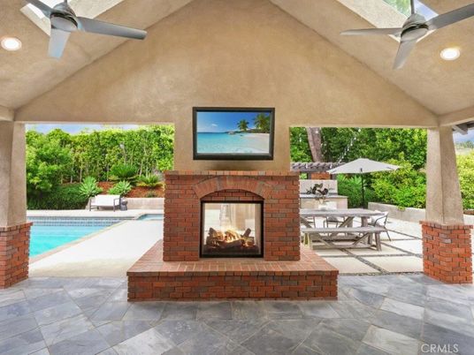 Exterior, Fireplace, Pool