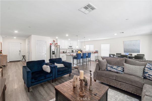 Dining room, Interior, Kitchen, Living room, Pendant Lights, Recessed Lighting, Stainless Steel Appliances, Wood Texture Flooring