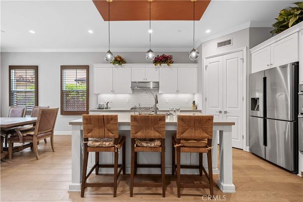 Dining room, Interior, Kitchen, Pendant Lights, Recessed Lighting, Stainless Steel Appliances, Wood Texture Flooring