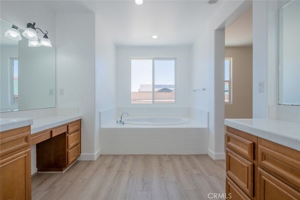 Bathroom, Interior, Recessed Lighting, Tile Countertops, Wood Texture Flooring