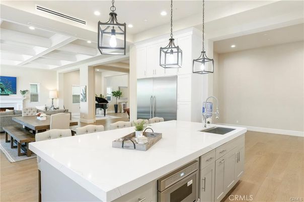 Dining room, Fireplace, Interior, Kitchen, Living room, Pendant Lights, Recessed Lighting, Stainless Steel Appliances, Wood Texture Flooring