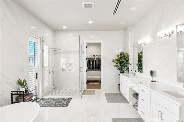 Bathroom, Dual Sink Vanities, Glass Shower, Interior, Marble, Marble Walls, Recessed Lighting