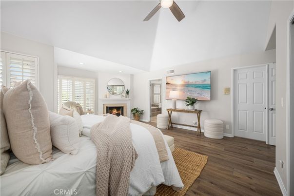 Bedroom, Fireplace, Interior, Recessed Lighting, Wood Texture Flooring