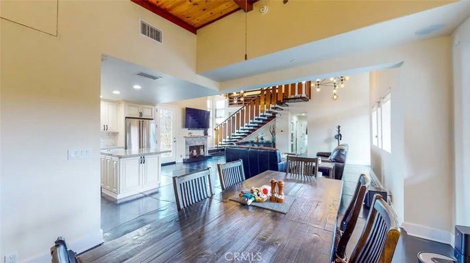 Dining room, Fireplace, Interior, Kitchen, Pendant Lights, Recessed Lighting, Stainless Steel Appliances, Wooden Beams, Wooden Ceilings, Wood Texture Flooring