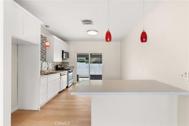 Interior, Kitchen, Pendant Lights, Stainless Steel Appliances, Wood Texture Flooring