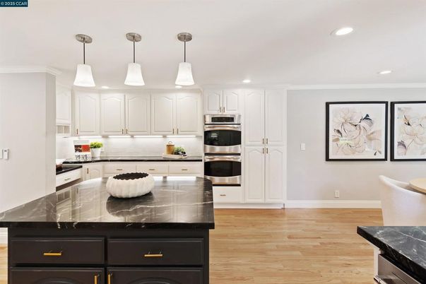 Interior, Kitchen, Pendant Lights, Recessed Lighting, Stainless Steel Appliances, Wood Texture Flooring