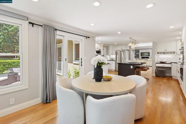 Dining room, Interior, Kitchen, Pendant Lights, Recessed Lighting, Stainless Steel Appliances, Wood Texture Flooring