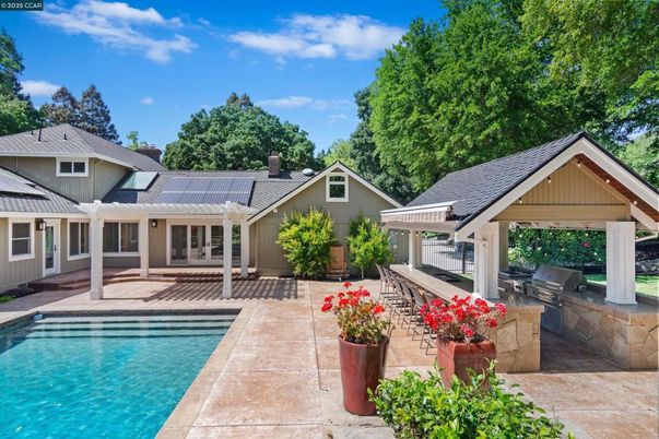 Exterior, Pool, Solar Panels
