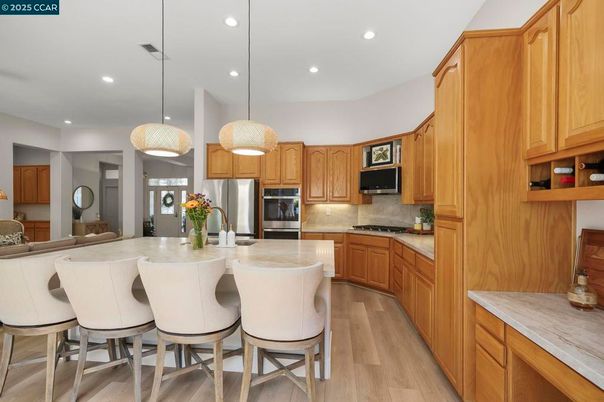 Interior, Kitchen, Pendant Lights, Recessed Lighting, Stainless Steel Appliances, Wood Texture Flooring