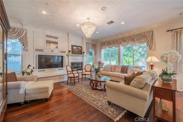 Chandelier, Fireplace, Interior, Living room, Recessed Lighting, Wood Texture Flooring