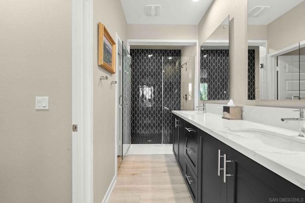 Bathroom, Dual Sink Vanities, Glass Shower, Interior, Recessed Lighting, Wood Texture Flooring