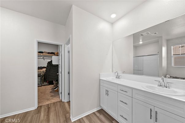 Bathroom, Dual Sink Vanities, Interior, Recessed Lighting, Wood Texture Flooring