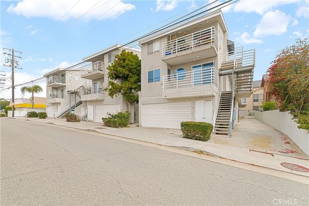 Attached, Exterior, Facade, Condo Building