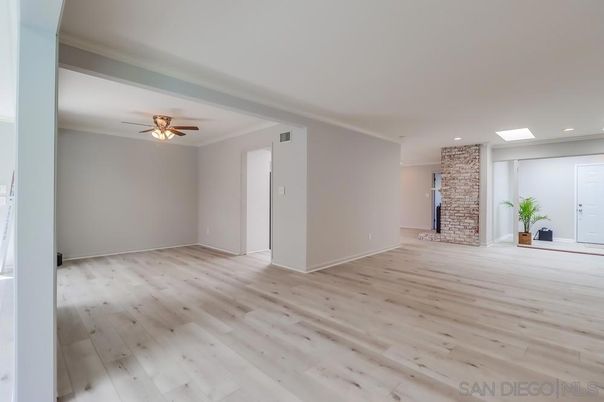 Empty room, Fireplace, Interior, Recessed Lighting, Stone Walls, Wood Texture Flooring