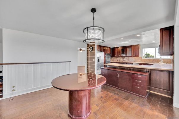 Billiard Table, Chandelier, Fireplace, Game Room, Interior, Stone Walls, Wood Texture Flooring