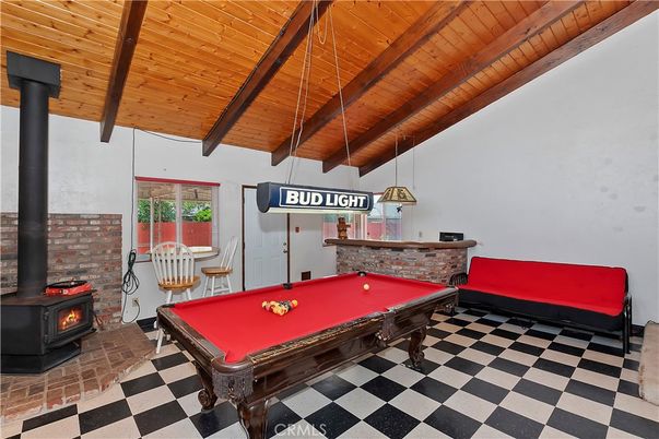 Billiard Table, Fireplace, Game Room, Interior, Pendant Lights, Stone Walls, Wooden Beams, Wooden Ceilings