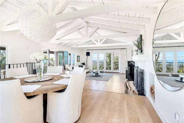 Chandelier, Dining room, Fireplace, Interior, Living room, Water, Wood Texture Flooring