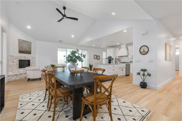Dining room, Fireplace, Interior, Kitchen, Recessed Lighting, Wood Texture Flooring
