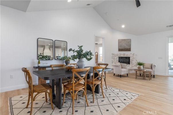 Dining room, Fireplace, Interior, Living room, Recessed Lighting, Wood Texture Flooring