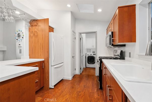 Interior, Kitchen, Recessed Lighting, Utility Closets, Washer, Wood Texture Flooring