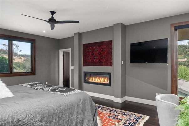 Bedroom, Fireplace, Interior, Recessed Lighting, Wood Texture Flooring