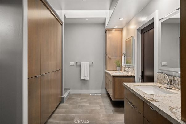 Bathroom, Dual Sink Vanities, Interior, Recessed Lighting, Wood Texture Flooring