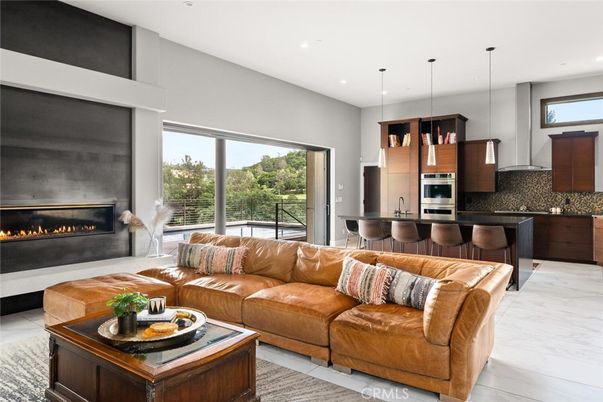 Fireplace, Interior, Kitchen, Living room, Marble, Pendant Lights, Recessed Lighting, Stainless Steel Appliances