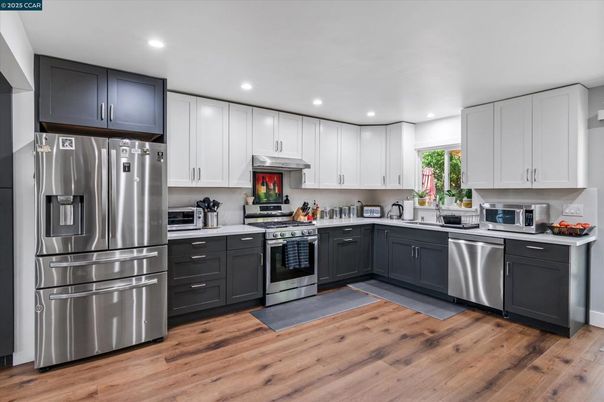 Interior, Kitchen, Recessed Lighting, Stainless Steel Appliances, Wood Texture Flooring