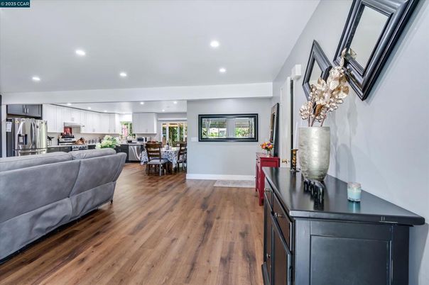 Dining room, Interior, Kitchen, Living room, Recessed Lighting, Stainless Steel Appliances, Wood Texture Flooring