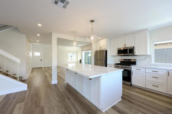 Interior, Kitchen, Pendant Lights, Recessed Lighting, Stainless Steel Appliances, Wood Texture Flooring