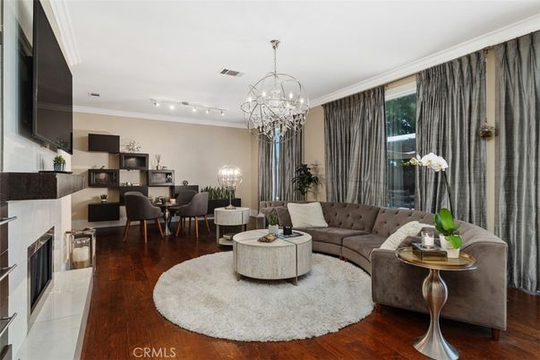 Chandelier, Dining room, Fireplace, Interior, Living room, Wood Texture Flooring
