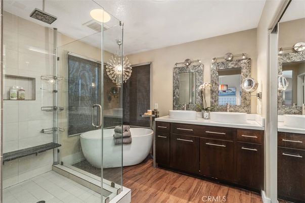 Bathroom, Dual Sink Vanities, Free Standing Baths, Glass Shower, Interior, Pendant Lights, Wood Texture Flooring