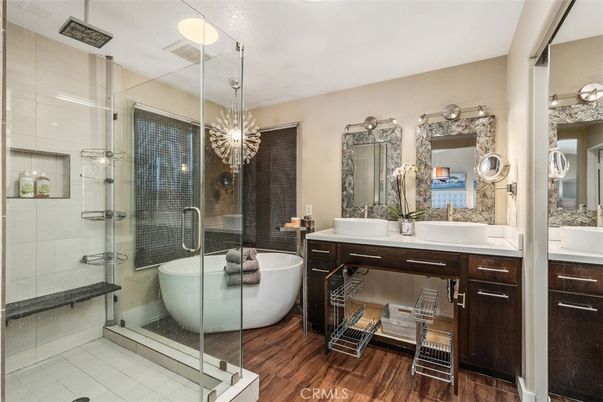 Bathroom, Dual Sink Vanities, Free Standing Baths, Glass Shower, Interior, Pendant Lights, Wood Texture Flooring