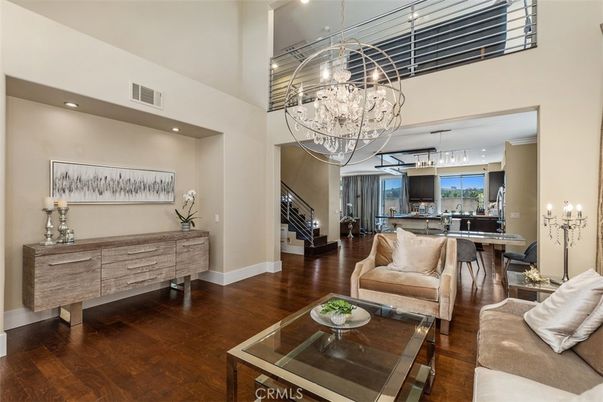 Chandelier, Dining room, Interior, Kitchen, Living room, Pendant Lights, Recessed Lighting, Wood Texture Flooring