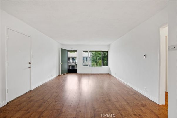 Empty room, Interior, Kitchen, Stainless Steel Appliances, Wood Texture Flooring
