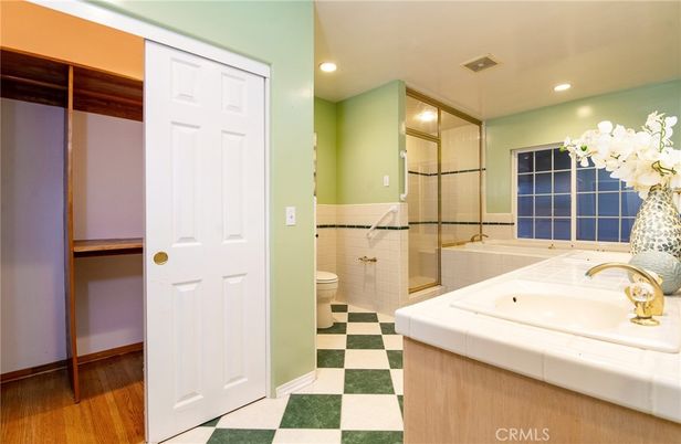 Bathroom, Dual Sink Vanities, Glass Shower, Interior, Recessed Lighting, Tile Countertops