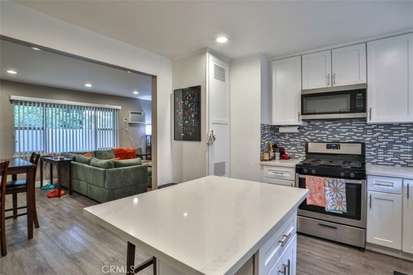 Interior, Kitchen, Living room, Recessed Lighting, Stainless Steel Appliances, Wood Texture Flooring