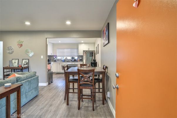 Dining room, Interior, Kitchen, Recessed Lighting, Stainless Steel Appliances, Wood Texture Flooring
