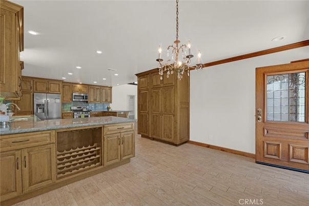 Chandelier, Interior, Kitchen, Recessed Lighting, Stainless Steel Appliances, Wood Texture Flooring